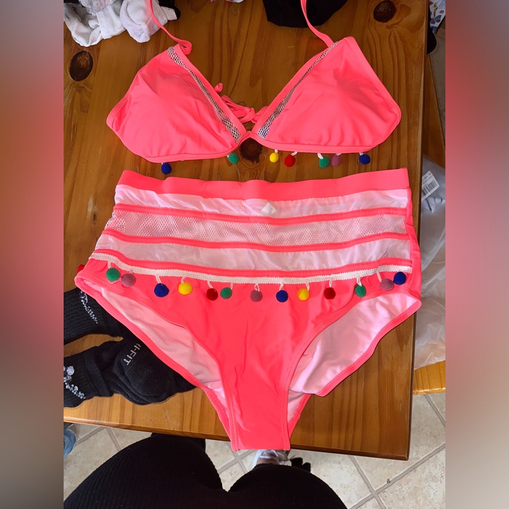 Coral color swim suit from Amazon new in package have size 1 medium & 1 xl